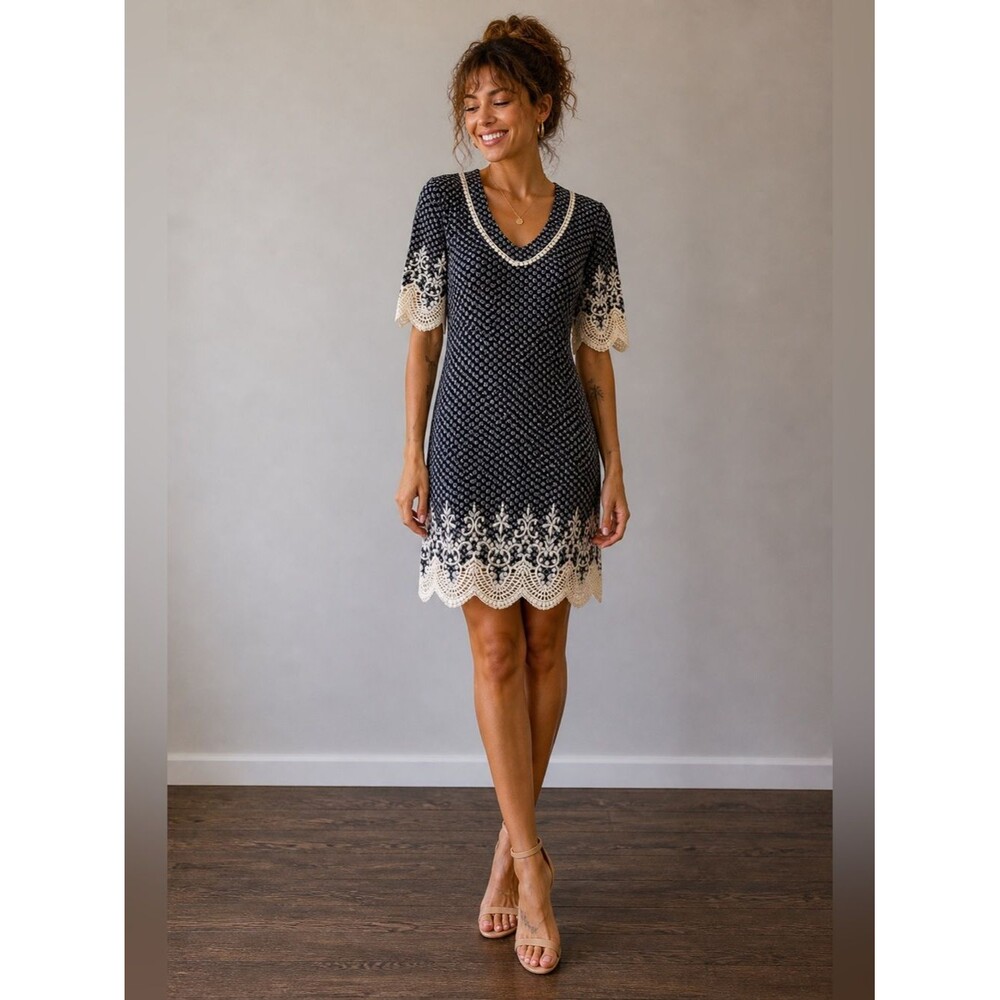 Beautiful mini dress by SunLight Paris. Medium